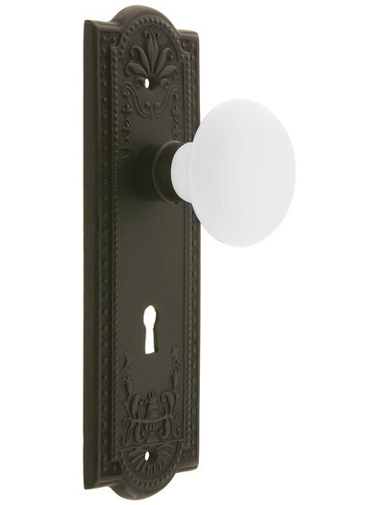Meadows Style Mortise Lock Set in Oil-Rubbed Bronze with White Porcelain Door Knobs.